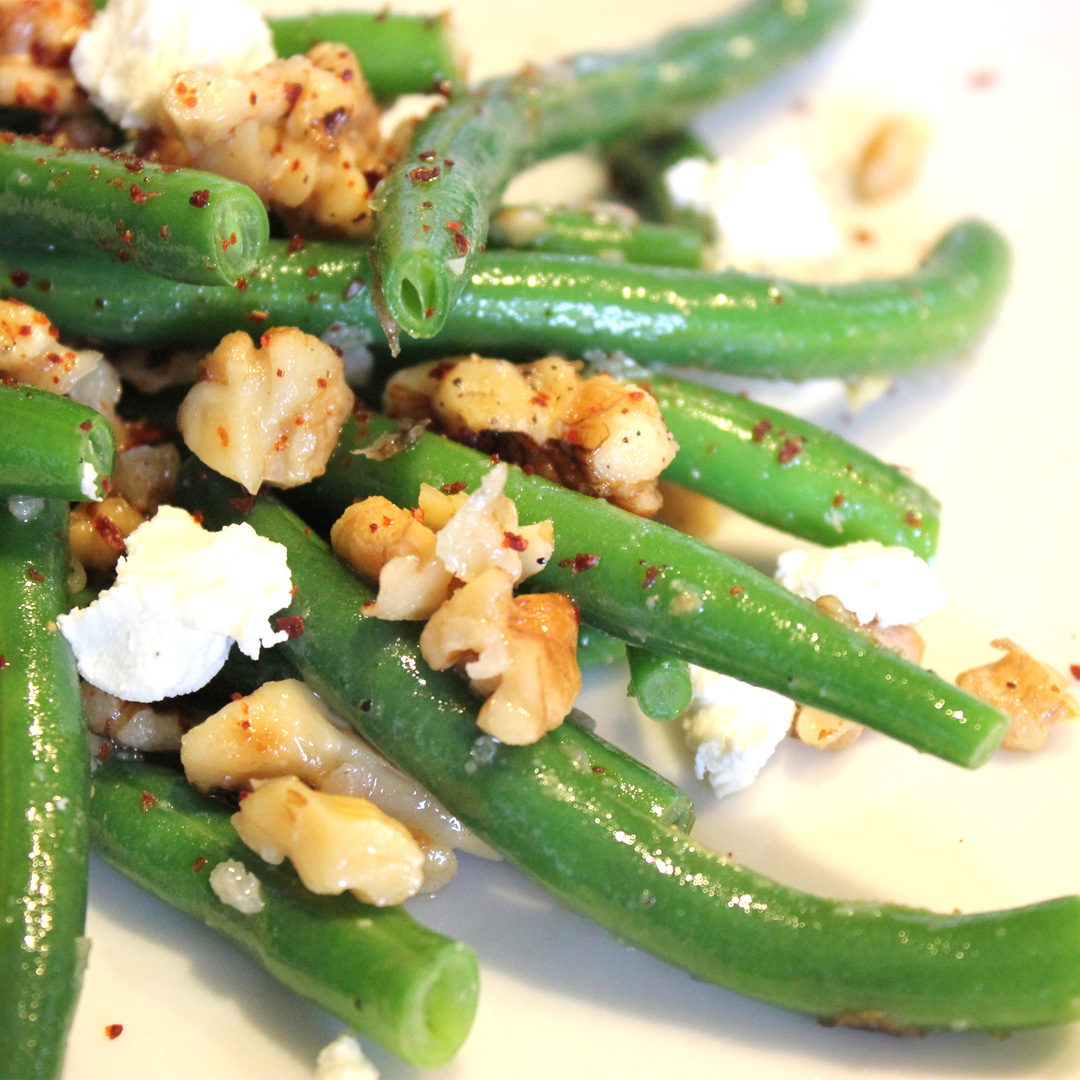 Green beans with almonds and goat cheese.