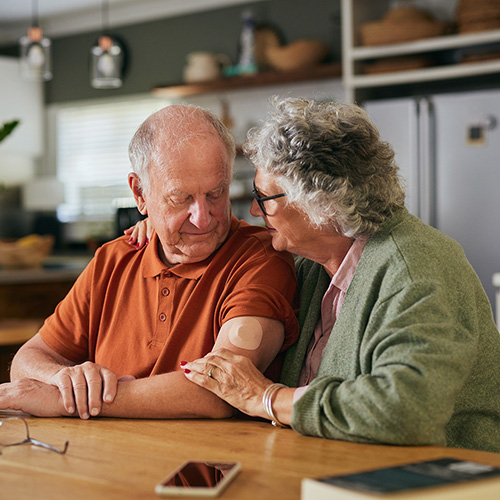 Older couple sitting together