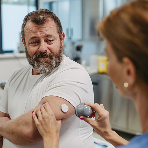 Older man seeing physician