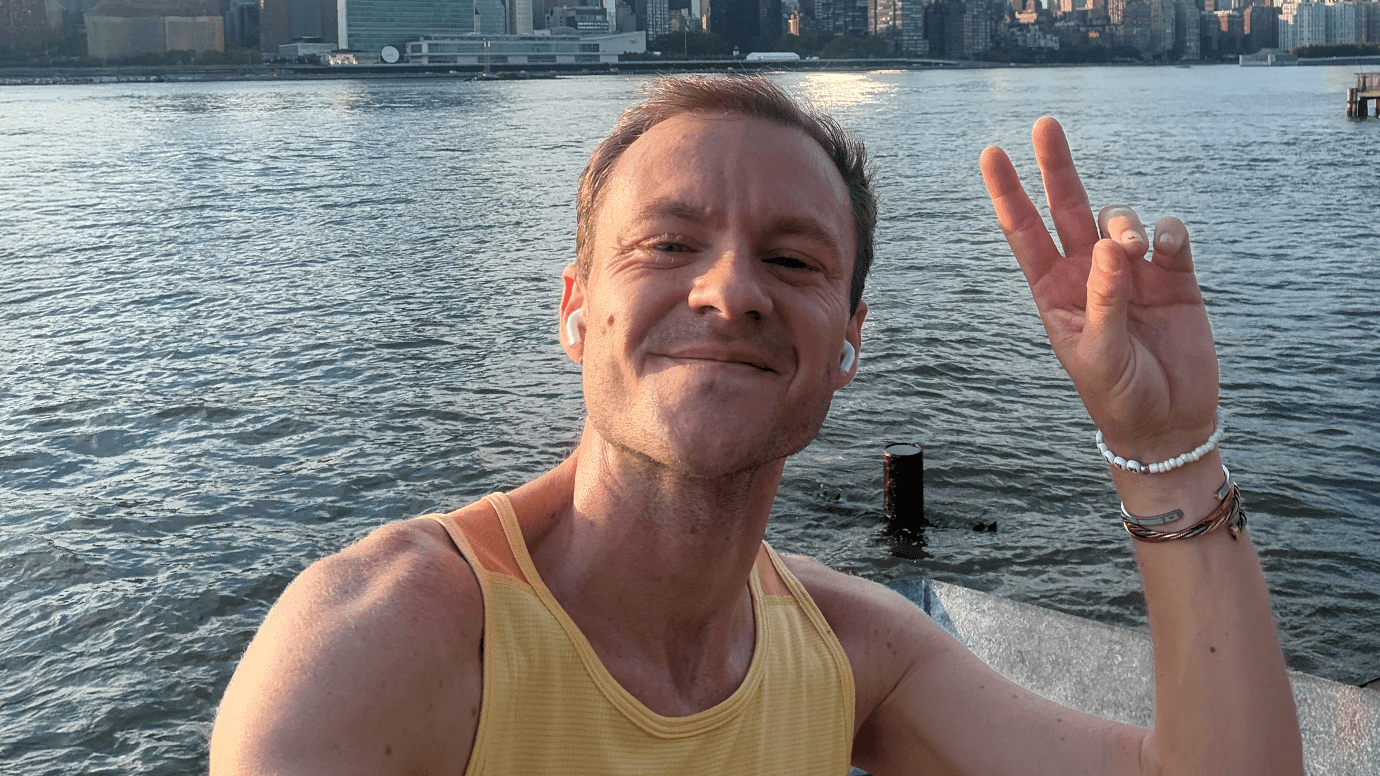 Tanner throws up the peace sign after a run.