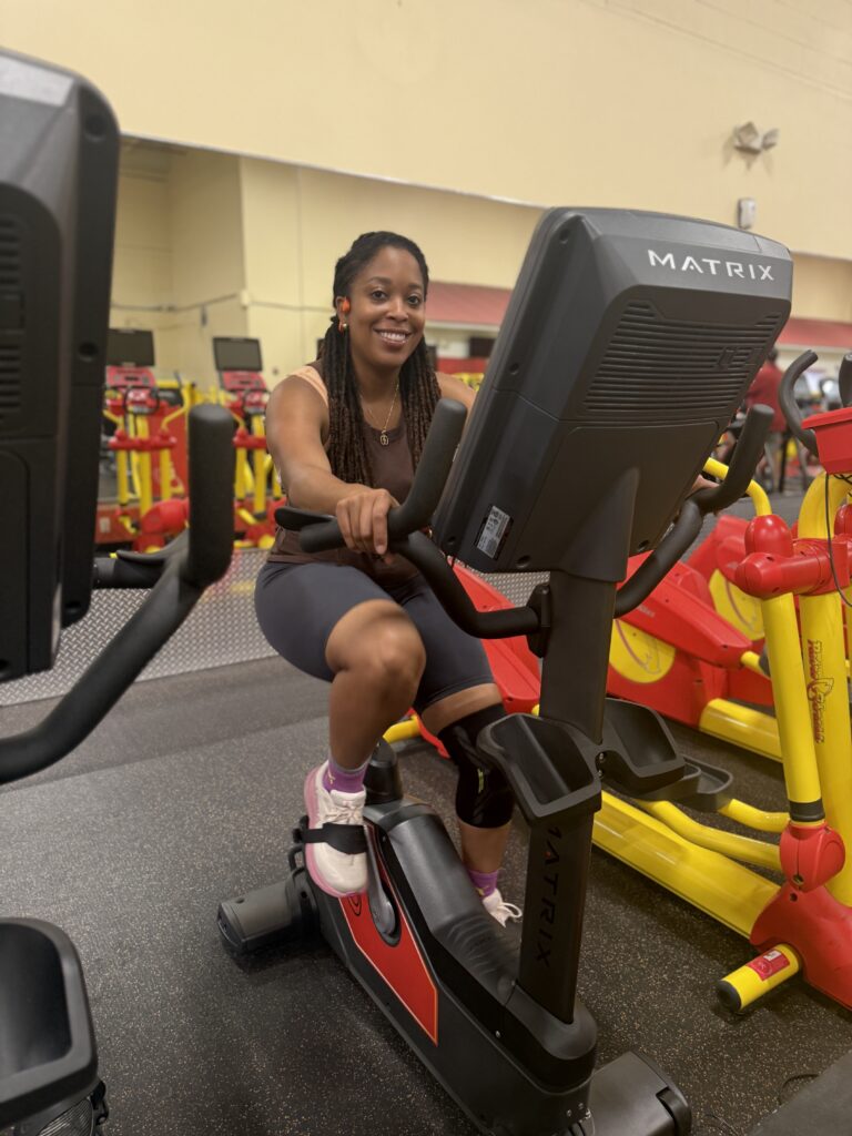 Ariel exercising on a bike.