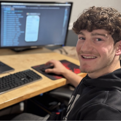 Man working on code on computer