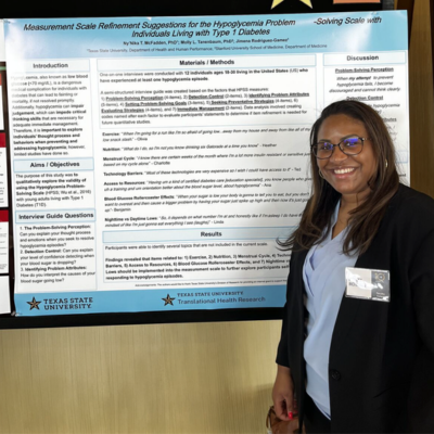 Woman in front of bulletin board